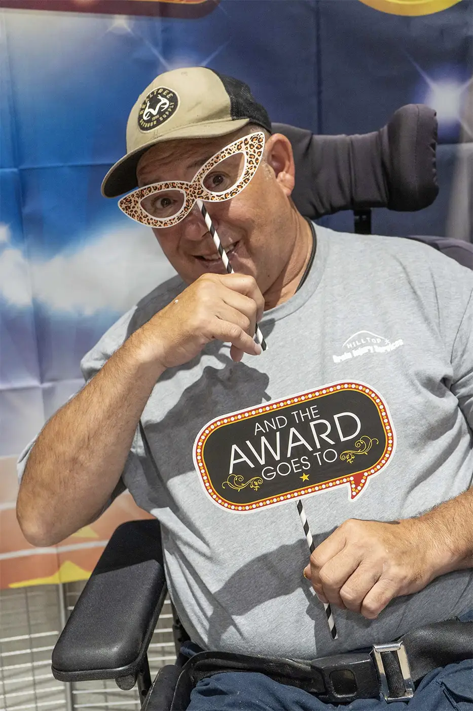 Photo of a man in a wheelchair having fun